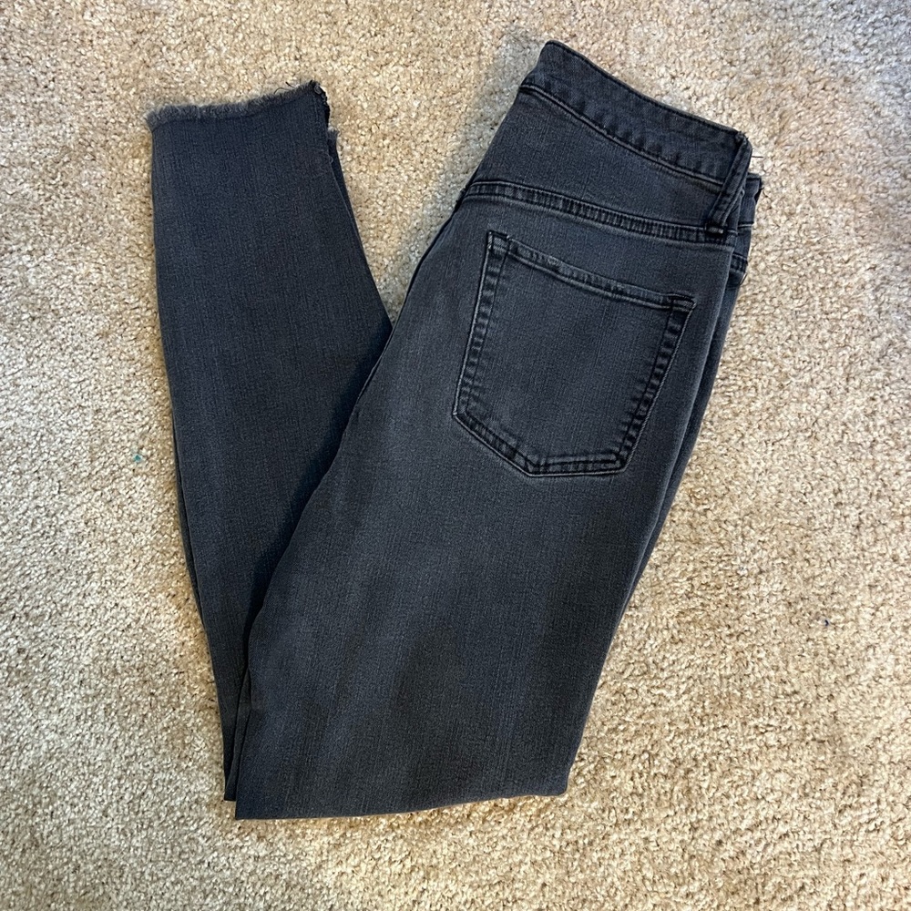 Black, ripped jeans.